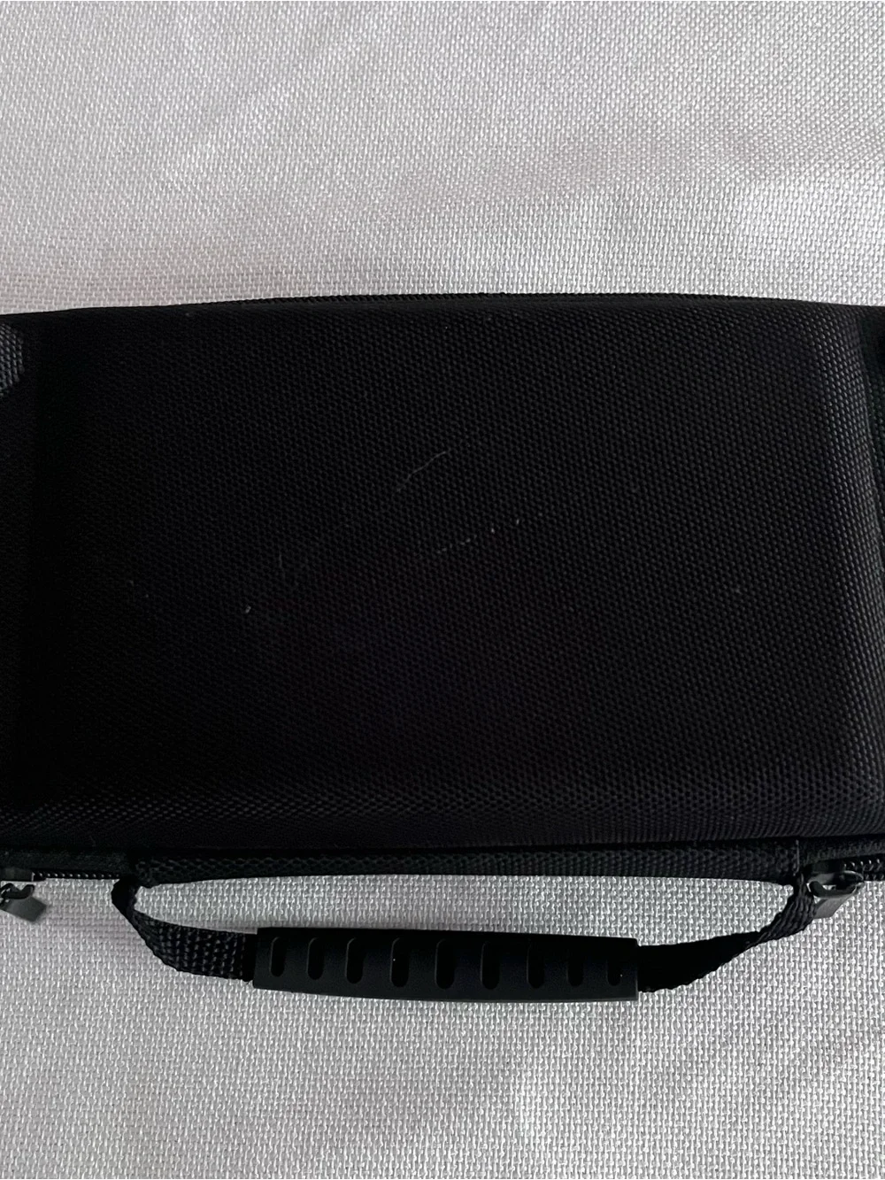 Source Unknown slim carrying